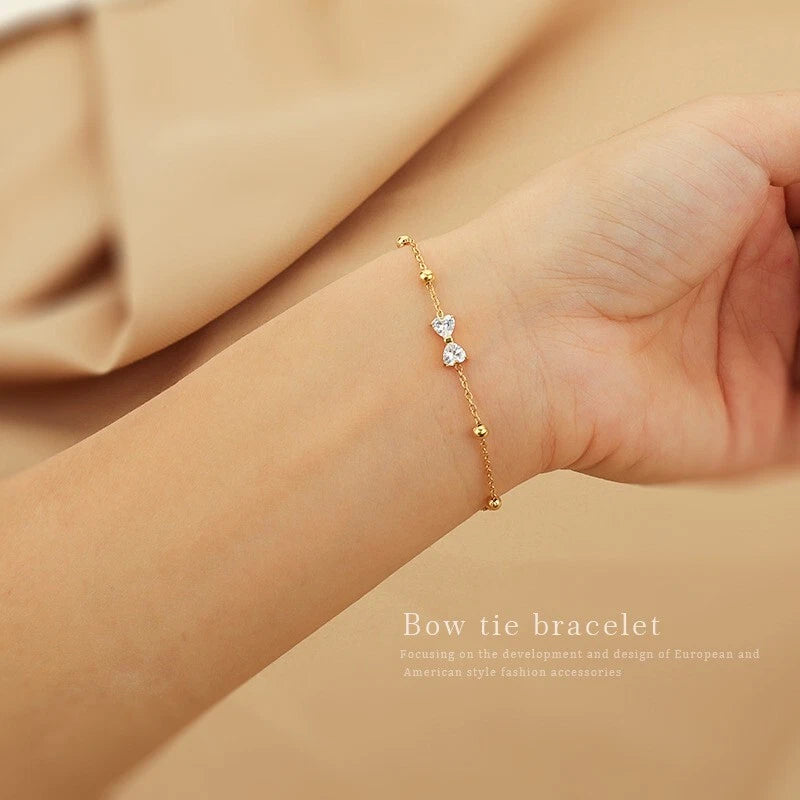 Woman 18K Gold Station Bead CZ Bow Chain Bracelet